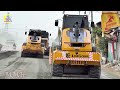 A group of new foundation construction machines is working together to grade and compact a road