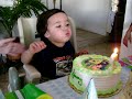 Jimmy blowing candle out 2nd bday