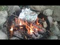 making hamburgers with no pan in a fire pit