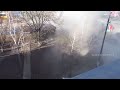 A tank fires in the direction of a cameraman during street battles in Borodianka Ukraine