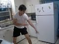 Dad and son fight in the kitchen