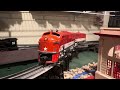 Lionel Prewar 9U pulling 200 series freight cars and running along side a 1950’s Texas Special!
