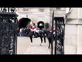 Guard asks for Help - rude tourist ￼ignores policeman and get’s what she deserves.