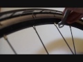 How to straighten a wheel rim on a bicycle