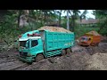 MOBIL RC TRUK HINO TRIBAL DAN FUSO BELAP BERMUATAN FUL KAYU MELEWATI JALAN BERLUMPUR OFROAD