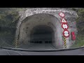 Driving through one-lane tunnels North of Klaksvik, Faroe Islands