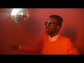 portrait shot with flashing red light cool black man in stylish outfit and sunglasses ra