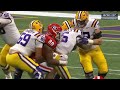 Georgia DL Jalen Carter holds LSU QB in the air while celebrating sack
