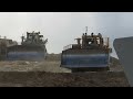 Cat D10T Dozers after pushing scrapers