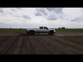 Duramax spinning tires in a field, billet 63.5 turbo