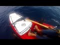 Incredible footage of a huge shark attack while kayak fishing in the ocean.