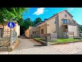 Skövde walks around and looks at nice houses on a summer morning 4k