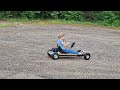 Homemade go kart, made of old hoverboard and garden trolley cart