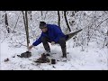 winter woods walk with coffee and stove
