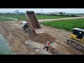 Huge Project EP-3 SHANTUI DH17-C3 bulldozer pushes soil to fill water, 25.5Ton dump truck Unloading
