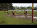 Niños jugando fútbol sobre el barro. En Puerto Nariño, Amazonas / Colombia