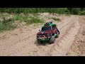 1/10 Scale Traxxas Trx4 Ford Bronco driving on sand road in the cassava field. rc car off road 4×4