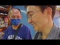 Bargaining at a Fake Market in Chinatown, Kuala Lumpur, Malaysia