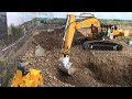 R C excavator with moving driver using automatic bucket change