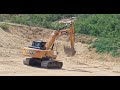 excavator sany sy215c working finishing and compacting lantai kolam tandon jadi seperti lapanganbola