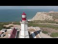 Lighthouse Cabo Espichel drone shots near the ocean.