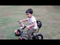 Baby riding a Bicycle l Baby riding a bike l Ryan's video from Kid's Toys and Slides