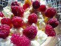 Curd dessert with raspberries, honey and condensed milk