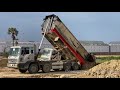 ឡានចាក់ដីជាប់ផុង Big dump truck fail stuck in deep & Recovery By Bulldozer