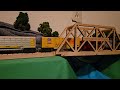 Wooden Union Pacific Bigboy 4014 pulling a long 8 car train with a caboose at the end