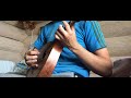 Black metal on 100 year old mandolin