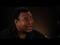George Benson playing along the neck