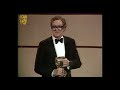 Audrey Hepburn presents Michael Caine with his BAFTA in 1984