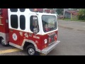 Ethan and Alyssa driving a Fire Truck at Blueberry Festival