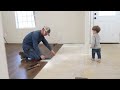 LIVING ROOM MAKEOVER *in progress*!!😍 FLOORING INSTALL | HOUSE TO HOME Honeymoon House Episode 4