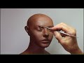 Sculpting  female head  in clay. Tutorial how to sculpt in a water based clay.