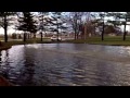 Traxxas Spartan in small pond flips over