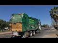 Garbage truck frontloader passing by