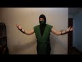 Idiot in a Mortal Kombat Reptile costume