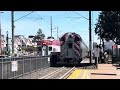 2 Caltrain meets at Burlingame station during a nice afternoon :)