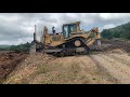 Cat D8R backfilling mine pit