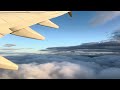 Plane passing through clouds