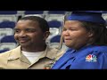 Sailor surprises sister at high school graduation