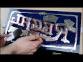 Sign Painting & gilding a traditional glass sign, using 12kt. white gold leaf & acid etching