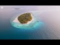 Maldives 4K - Flying Over Paradise Islands: Immersing in Nature's Timeless Charm