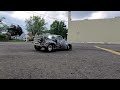 Traxxas slash 2wd skull truck running around the alley.