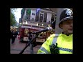 Police confront Xmas busker in Birmingham German Market