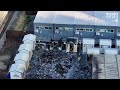 Drone video | Man arrested after fire damages 25 tiny homes near Seattle waterfront