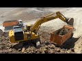 Komatsu Excavator loading truck