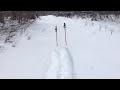 Walking backwards in GV Wide Trail snowshoes.
