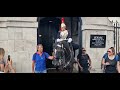 Armed police women tell tourist not to touch or pull the reins #thekingsguard